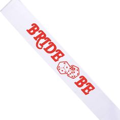 a white scarf with red letters and dice on it