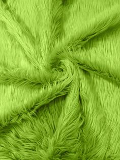 a green fur texture that looks like it has been dyed with neon colors and is very soft