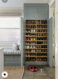 a shoe rack in the corner of a room