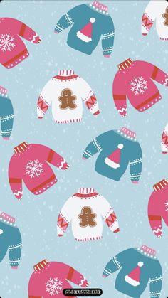 a blue and pink sweater with a gingerbread on the front is surrounded by snowflakes