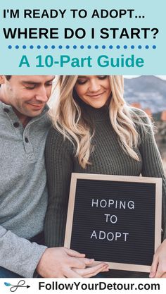 a man and woman holding a sign that says i'm ready to adopt where do i start?