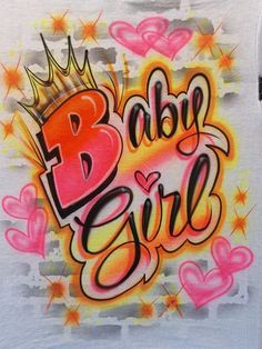 a t - shirt with the words baby girl painted on it