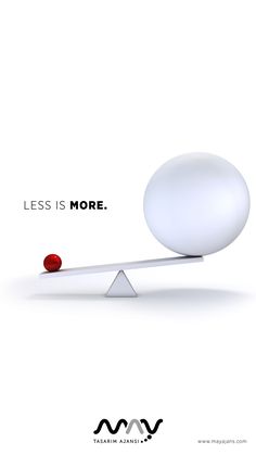 a white ball on top of a balance scale with the words less is more above it