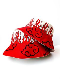 Bucket Hat, Naturo, Red Bucket Hat, Handmade, Handpainted Fashionable and comfortable bucket hat head accessory. Perfect for covering the face and eyes from sun All hats are painted by hand so there might be some ever-so-slight differences (maybe a thicker/thinner brush stroke in some spots) No screen printing or vinyl transfers, it's all made from the heart baby :) Other Bucket hats seen on this post can be found if you visit my Etsy shop! IMPORTANT CARE INSTRUCTIONS: Hand wash, Spot clean, Air Red Beach Cap, Red Outdoor Bucket Hat With Short Brim, Red Bucket Hat With Short Brim For Outdoor, Red Bucket Hat For Outdoor, Red Bucket Hat For Summer Outdoor, Red Bucket Hat For Outdoor Summer Activities, Red Wide Brim Bucket Hat For Outdoor, Red Short Brim Bucket Hat For Outdoor, Trendy Red Festival Hat