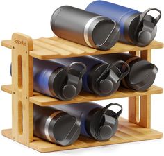 three tiered wooden rack with cups and mugs on it's sides for storage