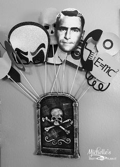 a black and white photo of a man's face with balloons attached to it