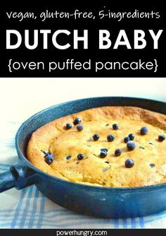 dutch baby with blueberries in a cast iron skillet and text overlay that reads vegan, gluten - free, 5 ingredients