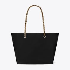 Instantly recognizable. The Ella Chain Tote is softly deconstructed in featherweight recycled nylon with a braided chain strap. Ideal for every day and getaways, it has a roomy interior for all the essentials, including a laptop. Tory Burch Ella, Miller Sandal, Designer Tote Bags, Womens Designer Handbags, Designer Totes, Leather Wraps, Tote Bag Design, Chain Strap, Leather Trims