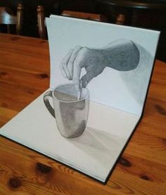 a card with a drawing of a hand pouring water into a cup on top of a table