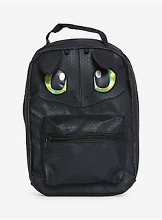 a black backpack with green eyes on it