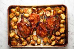 chicken and potatoes in a roasting pan