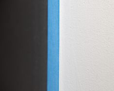 a white and blue wall next to each other