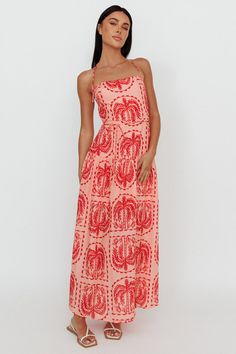 Red, palm tree print maxi dress Partially lined Halterneck Zipper in back Breeze through the weekend in our chic Natasia maxi dress. We are obsessed with its Summery palm print and classic halterneck style. Perfect for champagne brunch with your girls teamed with kitten heels and a saddle bag for a sophisticated look t Affordable Tropical Print Maxi Dress, Affordable Printed Summer Maxi Dress, Luxury Tropical Print Maxi Dress For Beach, Cheap Tropical Style Maxi Dress For Beach, Affordable Fitted Tropical Dresses, Luxury Beach Sundress Maxi Dress, Luxury Summer Maxi Dress For Poolside, Luxury Vacation Maxi Dress With Adjustable Straps, Luxury Spring Poolside Maxi Dress