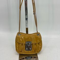 Miu Miu 2 Way Bag Yellow With Silver Hardware 9x2x7 Includes Adjustable Shoulder Strap 1 Exterior Pocket 2 Interior Pockets Item Shows Signs Of Wear From Normal Use- Color Transfer On Back Fading Color Marks On Interior And Exterior Scratched Hardware Worn Piping Etc Please Refer To Photos For Further Details Sku- Fys82308 Brown Miu Miu Shoulder Bag With Gold-tone Hardware, Miu Miu Travel Bag With Gold-tone Hardware, Miu Miu Brown Bag With Gold-tone Hardware, Brown Miu Miu Bag With Gold-tone Hardware, Miu Miu Shoulder Bag With Adjustable Strap For Travel, Miu Miu Brown Satchel Bag, Designer Miu Miu Shoulder Bag For Travel, Miu Miu Everyday Satchel Shoulder Bag, Miu Miu Brown Bag With Detachable Strap