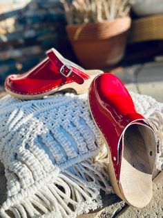 Elevate your footwear game with these vibrant Bright Red Vintage Clog Shoes, a striking pair that adds a pop of color and retro charm to your wardrobe. These clogs are not just stylish; they also provide comfort and character. They are available in size 41, which translates to approximately US 10-10.5, UK 7.5-8, and EU 41-42. Key Features: Bold Red Hue: The bright red color makes these clog shoes a standout choice, perfect for adding flair to your outfit. Vintage Charm: These clogs exude a retro Red Closed Toe Clogs With Cushioned Footbed, Red Clogs With Removable Insole And Round Toe, Red Closed Toe Clogs With Wooden Heel, Red Clogs With Wooden Heel And Round Toe, Red Closed Toe Clogs With Rubber Sole, Red Slip-on Clogs With Wooden Heel, Red Closed Toe Clogs With Leather Sole, Vintage Ralph Lauren Sweater, Red Clogs