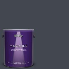 a purple paint can with the words marquee on it's bottom half