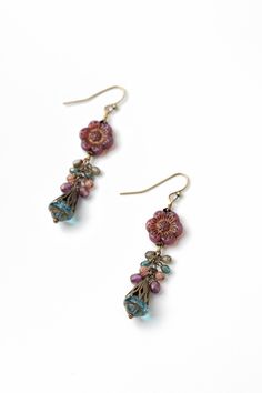 From the Mauve collection these earrings are longer in design and handcrafted with a fun Czech glass flower focal. Antique Brass (nickel and lead-safe) Czech Glass 2.5", with antique brass ear wires We hand select our natural materials, thus there may be slight variations in color and/or size that will not detract from the overall aesthetic Our unique handcrafted designer jewelry for women is made in America, each design created individually in our personal design studio in Floyd VA USA Handmade Czech Glass Flower Earrings In Vintage Style, Handmade Czech Glass Vintage Flower Earrings, Handmade Vintage Czech Glass Flower Earrings, Vintage Czech Glass Flower Earrings For Gift, Vintage Czech Glass Flower Earrings Gift, Handmade Czech Glass Flower Dangle Earrings, Vintage Multicolor Czech Glass Earrings, Nickel Free Czech Glass Flower Earrings, Nickel-free Czech Glass Flower Earrings