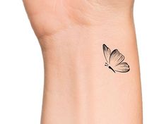 White Butterfly Tattoo, 40 Aesthetic, Cool Wrist Tattoos, Butterfly Tattoos For Women, Small Pretty Tattoos, Tasteful Tattoos, Small Butterfly