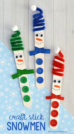 three snowmen made out of popsicle sticks