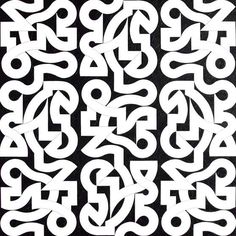 a black and white pattern with letters in the shape of an abstract design, on a black background