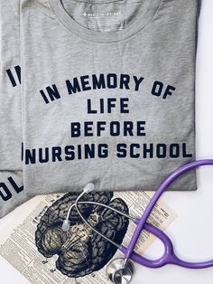 a shirt that says in memory of life before nursing school next to a stethoscope