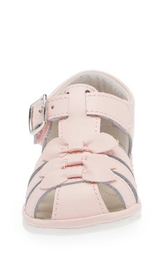 Your little one will love stepping out in this soft leather fisherman sandal topped with a dainty bow and outfitted with an arch-supporting footbed. Adjustable hook-and-loop strap Leather upper and lining/rubber sole Imported Casual Pink Sandals With Bow, Cute Bow Sandals With Round Toe, Cute Sandals With Bow And Round Toe, Cute Leather Sandals For Spring, Bow Sandals, Stepping Out, Little One, Soft Leather, Rubber Sole