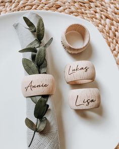 place setting with napkin rings and wooden name tags