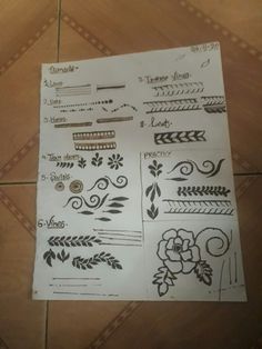 several different types of tattoo designs on a piece of paper