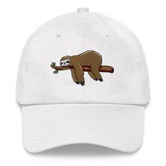 a white hat with a slotty on it's back and a branch in the middle