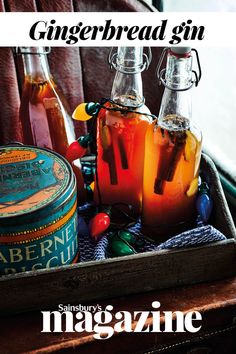 an old suitcase is filled with bottles of gingerbread gin and other condiments