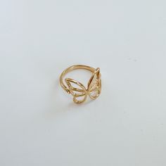 Elevate your accessories game with the Ava Butterfly Ring! Made with adjustable sizing, this unique ring features a delicate butterfly design that adds a whimsical touch to any outfit. Stand out and express your individuality with this must-have piece. 18k gold filled over brass size: adjustable Tarnish-resistant, waterproof, and safe for sensitive skin Delicate Butterfly, Butterfly Ring, Unique Ring, Gift Card Sale, Butterfly Design, Pitcairn Islands, Papua New Guinea, Guinea Bissau, Chain Pendants