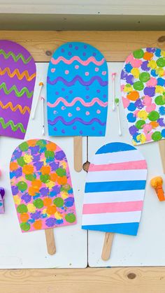 popsicle art project for kids using paper plates and colored ice creams on sticks