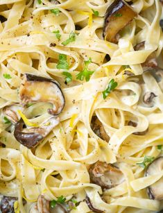 pasta with mushrooms and parmesan cheese in a skillet, ready to be eaten