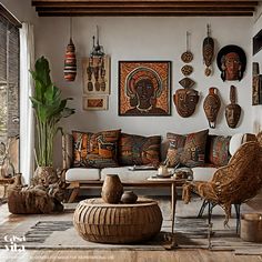 a living room filled with lots of different types of pillows and decor on the wall