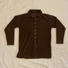 "Vintage brown corduroy button-up shirt in great condition  - Lowest button is missing & some very minor wear to the material in places, see photos Measurements (taken flat): - Pit to pit: 19\" - Top to bottom: 27\" - Sleeve inseam: 18 1/2\" **PLEASE NOTE** This is a vintage item, which means it is 20+ years old, which means a few things: 1) There will most likely be at least a little wear & tear! 2) Tag sizes will not be accurate!  3) Its production date is oftentimes approximate! ...I do my be Womens Blouses, Brown Corduroy, Striped Polo Shirt, 20 Years Old, Vintage Brown, 20 Years, Womens Clothing Tops, Button Downs, Button Up Shirts