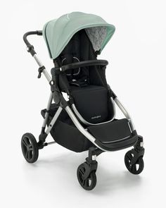 a baby stroller with a green canopy