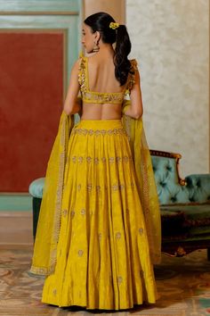 Lime yellow lehenga with floral woven motifs and cutdana, bead, sequin embroidery in floral pattern. Paired with zari embroidered padded blouse and pure tissue dupatta. - Aza Fashions Yellow Chikankari Embroidered Sharara For Reception, Yellow Chikankari Embroidery Sharara For Reception, Yellow Chikankari Embroidered Dupatta For Reception, Yellow Anarkali Set With Chikankari Embroidery For Reception, Yellow Chikankari Embroidery Dupatta For Reception, Gold Chikankari Embroidery Sets For Reception, Gold Sets With Chikankari Embroidery For Reception, Designer Yellow Lehenga With Chikankari Embroidery, Unstitched Yellow Gown With Resham Embroidery