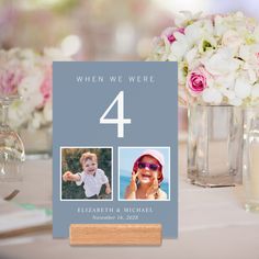 a table topped with vases filled with flowers and photos next to candles on top of a table