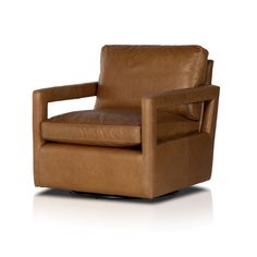 a brown leather chair sitting on top of a white floor