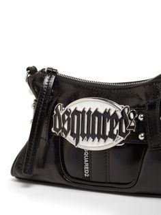 Find DSQUARED2 Gothic Belted Leather Shoulder Bag on Editorialist. Height: 15cm Width: 23cm Depth: 5cm. Strap drop: 56cm. Top handle drop: 23cm. Detachable strap. Detachable metal chain top handle. Top zip closure. Metal logo detail Chain Top, Metal Logo, Metallic Logo, Metal Chain, Leather Shoulder Bag, Top Handle, Black Leather, Shoulder Bag, Chain