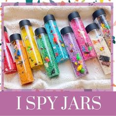 there are many different types of jars in this box with the words i spy jars on it