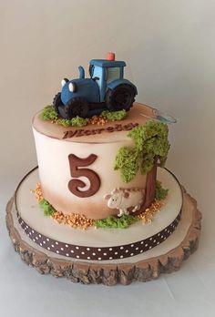 a birthday cake with a tractor on top