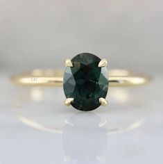 -: Made To Order Details :- Oval Cut Teal Sapphire Ring, Teal Sapphire Solitaire Ring, Blue Green Sapphire Ring, Promise Ring, September Birthstone, Anniversary Gift ✔  Metal : 925 Sterling Silver, ✔ Gemstone : Natural Teal Sapphire  ✔ Shape : Oval  ✔ Size : 7x9 mm ✔ Ring Size :- 3-12 US ✔ Finish : Yellow gold plated, Rose gold plated and White Gold Plated ✔  Ready To Ship in - 5 to 7 business Working day. ✔  For Fast Delivery Kindly Pay 30.00 USD Extra ✔  All the jewelry in my store is handmade Blue Green Sapphire Ring, Teal Sapphire Ring, Lost Horizon, Green Sapphire Ring, Sapphire Solitaire Ring, Oval Cut Ring, Blue Green Sapphires, Teal Sapphire, Green Oval