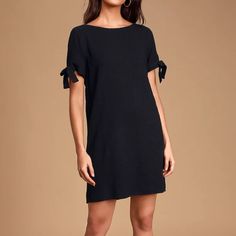 Maeve Black Button Back Shift Dress From Lulus. Brand New With Tag. Black Button-back Dress For Work, Black Workwear Dress With Button Back, Black Work Dress With Button Back, Black Spring Dress With Button Back, Spring Black Dress With Button Back, Lulus Dresses, Black Button, Shift Dress, Wedding Dresses