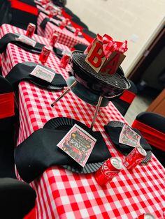 red and white checkered table cloths with black napkins