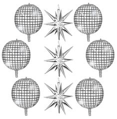 four silver christmas ornaments hanging from strings on a white background with the reflection of them in the mirror balls