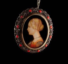 This is a most beautiful hand painted cameo portrait pendant that hangs from a sterling chain. Really quite a gorgeous pendant is also a brooch . This is not a print. It is one that will surely draw attention and bring you many compliments. 9-1-19 Victorian Pendant Necklace With Brooch Detail, Victorian Locket Jewelry For Evening, Victorian Jewelry Locket For Evening, Antique Locket Jewelry For Evening, Antique Medallion Jewelry For Evening, Antique Locket For Evening Wear, Evening Brooch Pendant Necklaces, Pendant Necklaces With Brooch For Evening, Victorian Baroque Engraved Jewelry