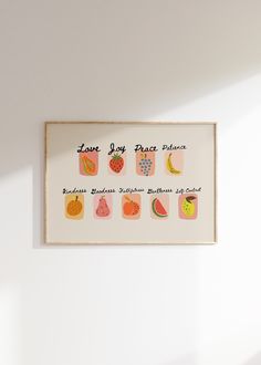 a white wall with some fruit on it