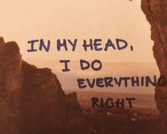 the words in my head, i do everything right are written on a rock face