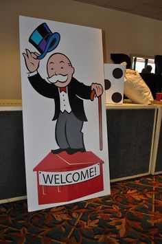 a welcome sign with an image of a man holding a cane and top hat on it